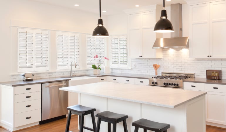 Plantation shutters in a bright Denver kitchen.